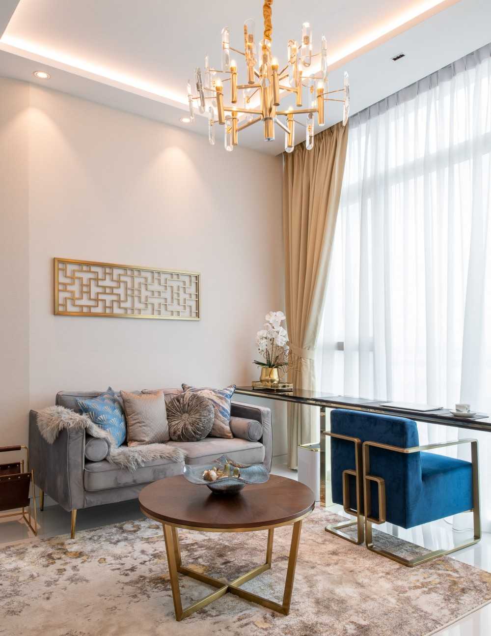 Asian Living Room with Chandelier and Sofa