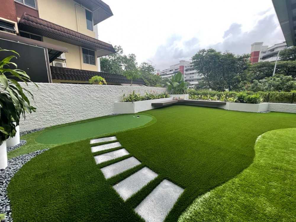 Modern Garden with Outdoor Chairs and Paintings