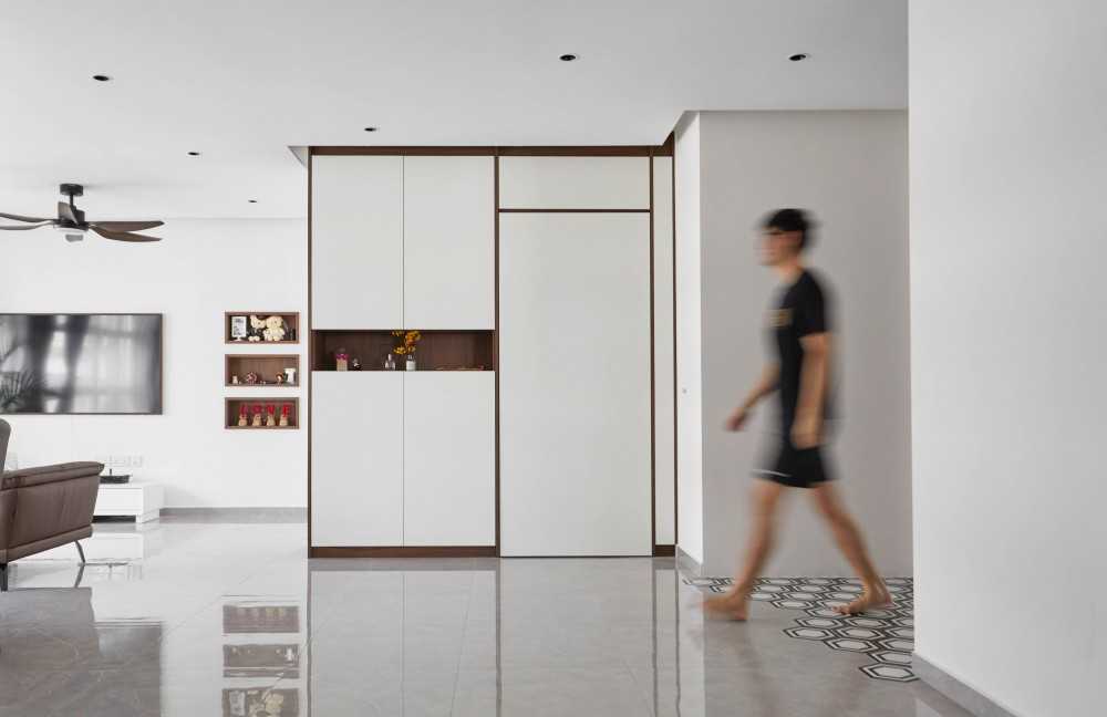 Contemporary Entryway with Storage Cabinets and Clothes Storage