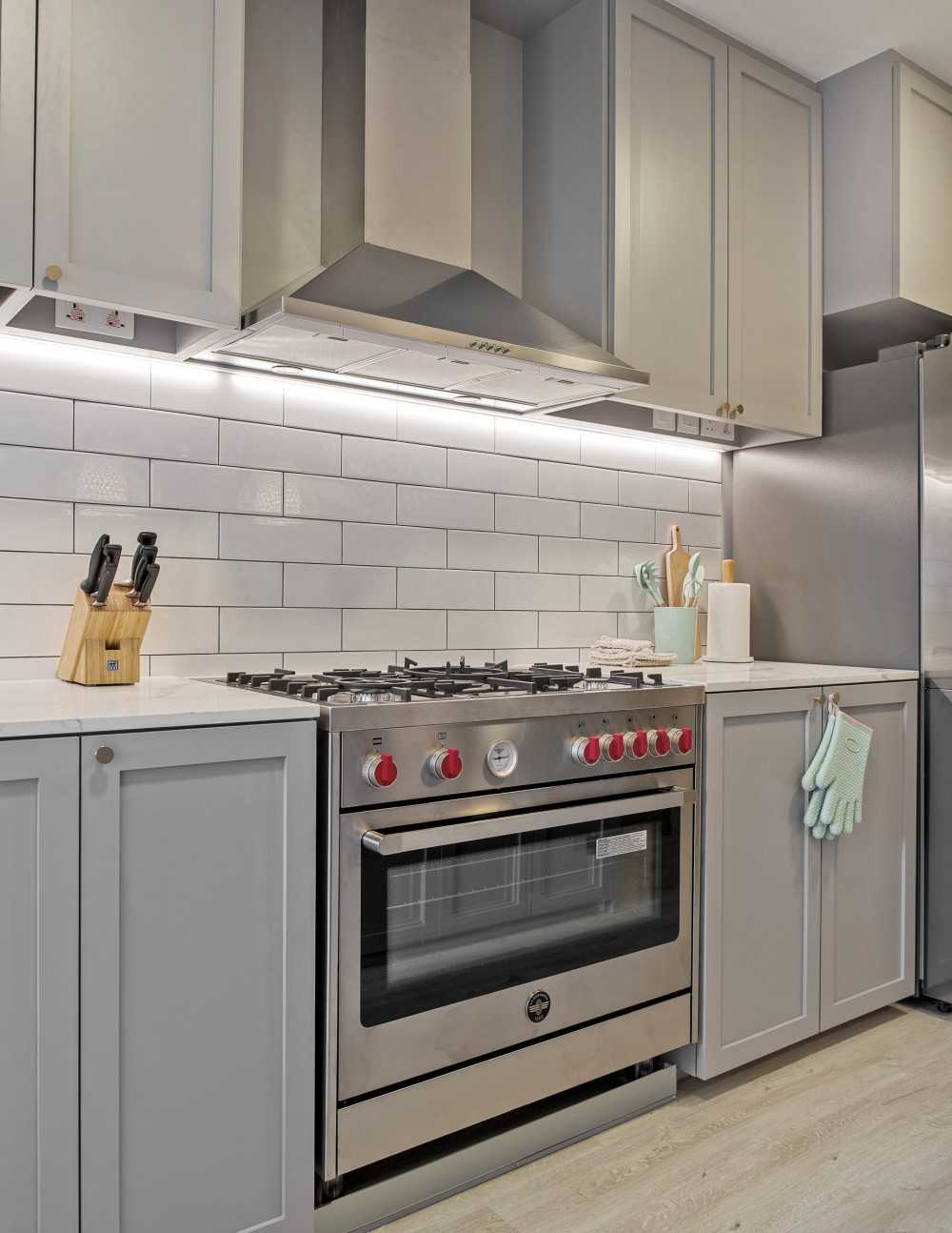 Scandinavian Kitchen with Mosaic and Breakfast Counter