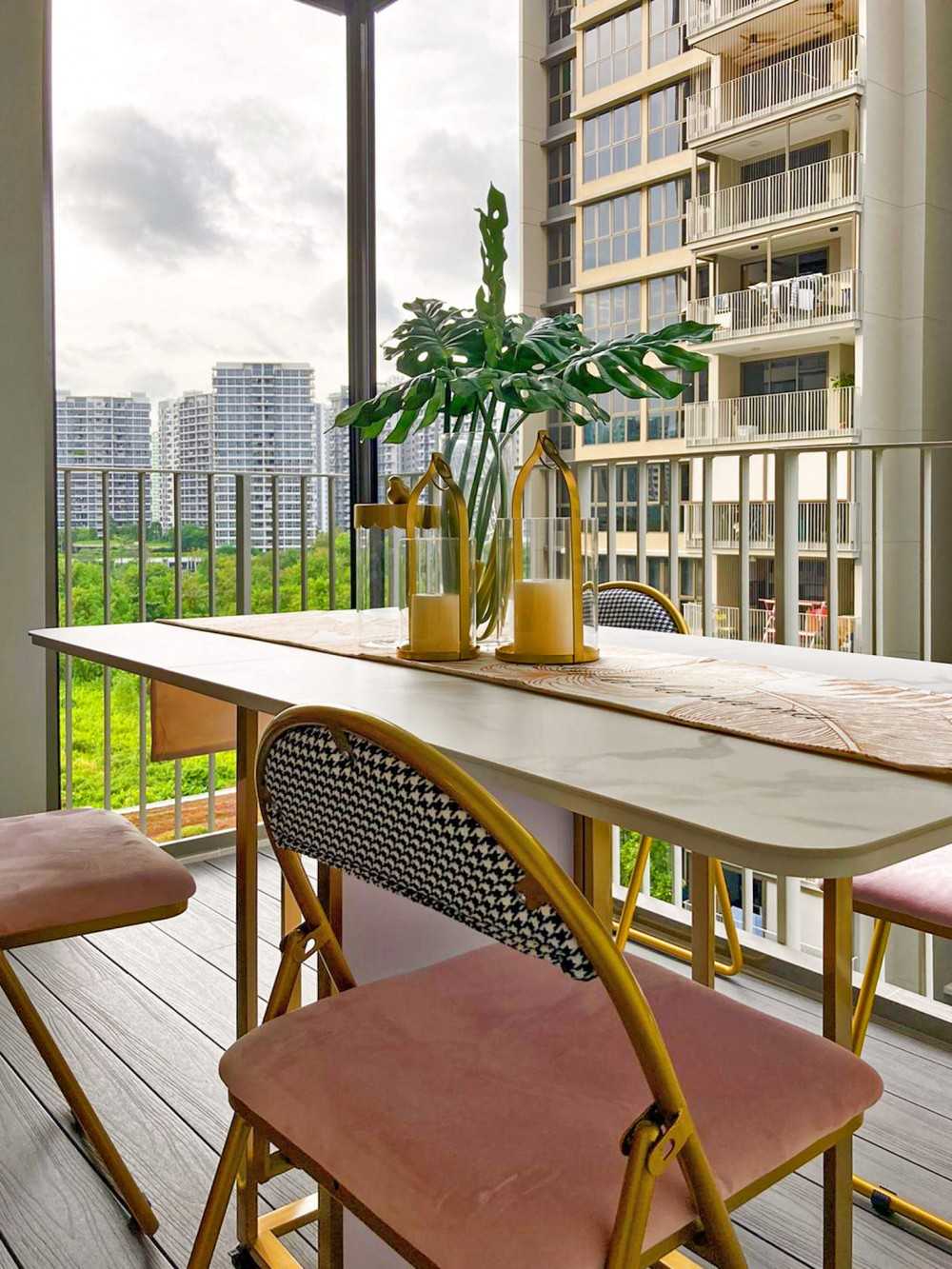 Modern Balcony with Window Shutters and Outdoor Table