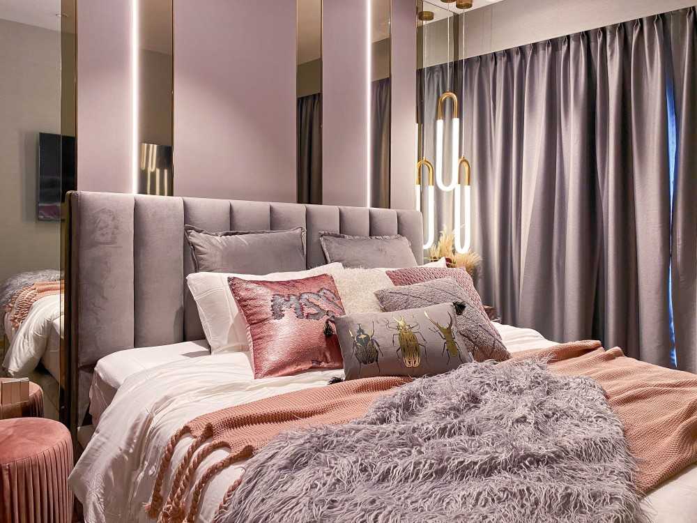 Modern Bedroom with Cove Lighting and Bedside Table