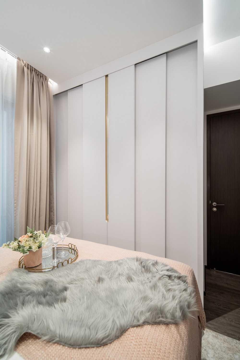 Modern Bedroom with Cove Lighting and Wardrobe