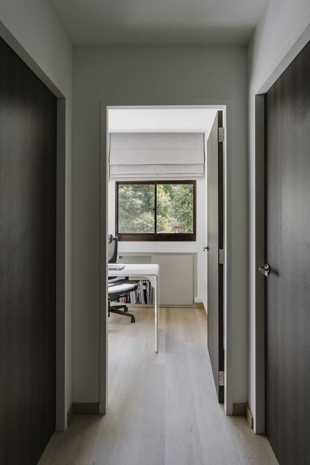 Modern Hallway with Window Grille and Curtain