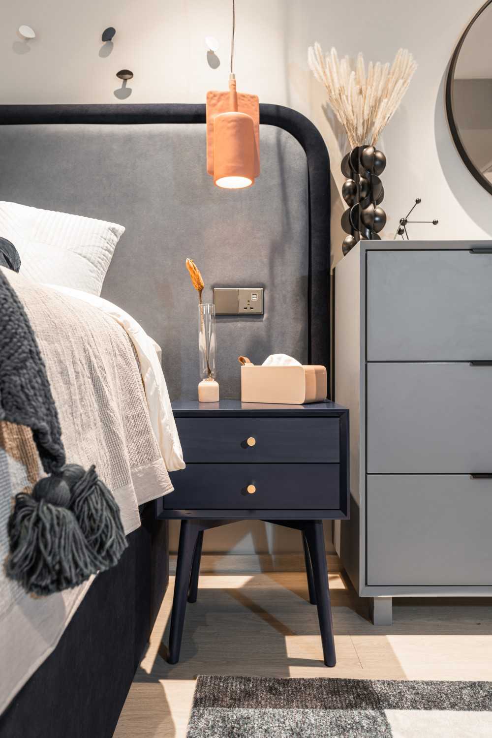 Modern Bedroom with Cove Lighting and Bedside Table