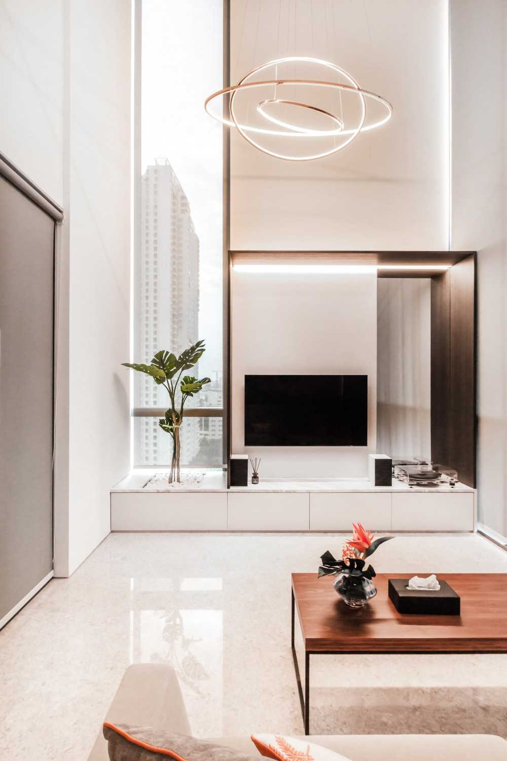 Modern Living Room with Cove Lighting and Downlights