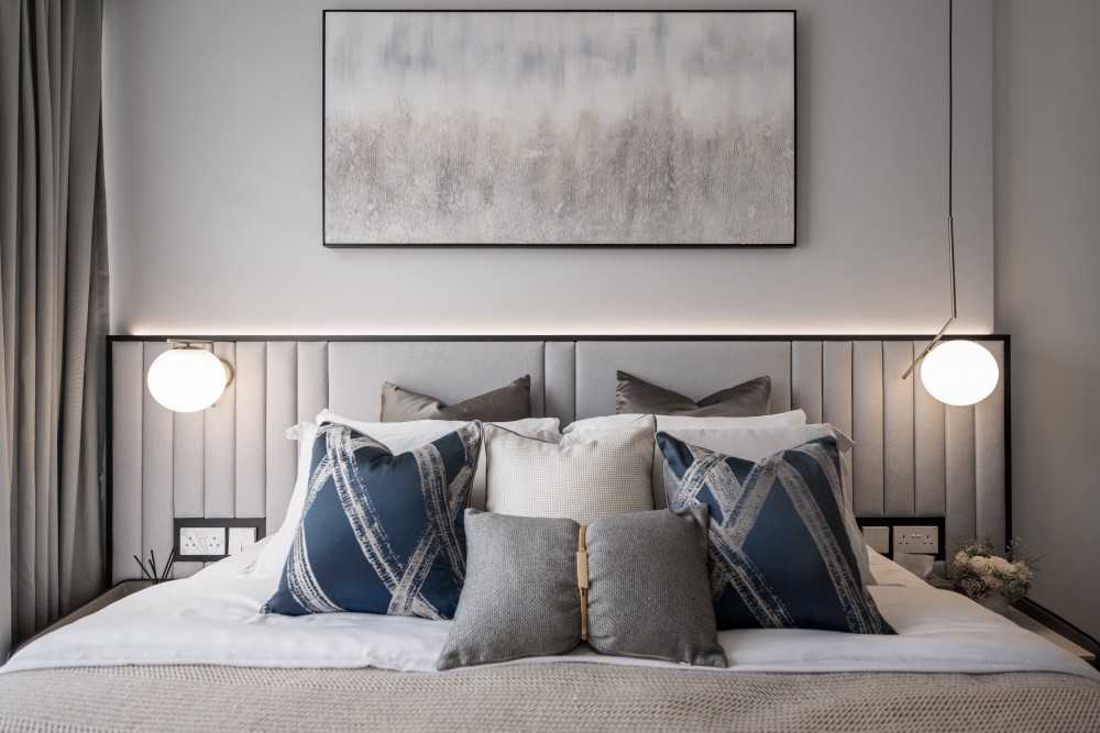 Contemporary Bedroom with Cove Lighting and Built-in Bed