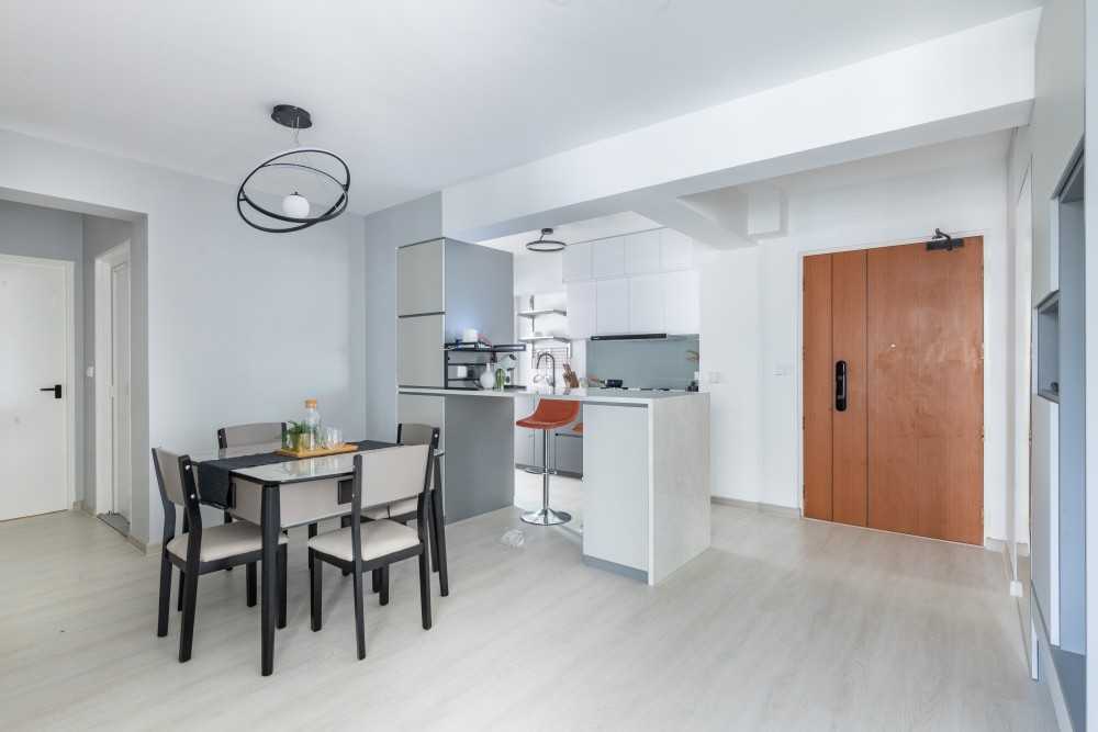 Minimalist Dining Room with Vinyl Flooring and Kitchen Island