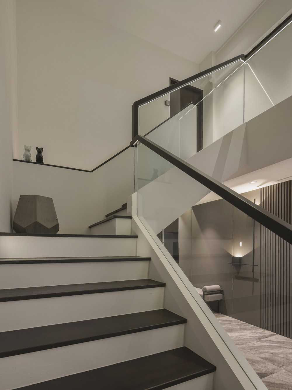 Modern Hallway with Feature Wall and Staircase