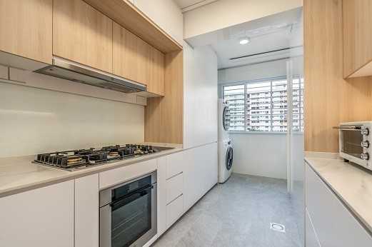 Scandinavian Kitchen with Homogeneous Tiles and Washing Machine