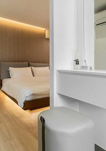 Scandinavian Bedroom with Vinyl Flooring and Drop Light