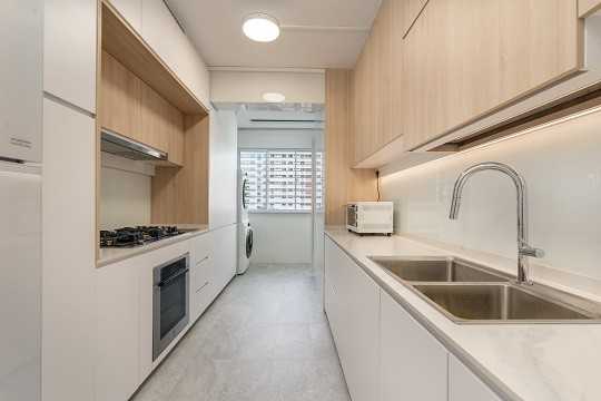 Scandinavian Kitchen with Homogeneous Tiles and Cupboard