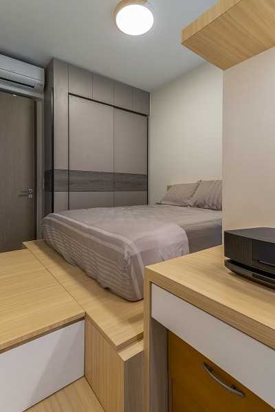 Scandinavian Bedroom with Platform Bed and Ceiling Light