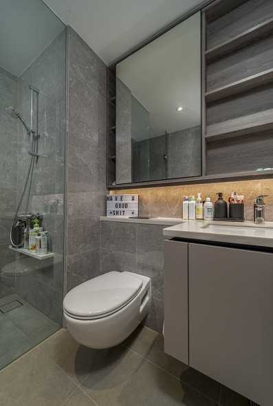 Scandinavian Bathroom with Homogeneous Tiles and Mirror