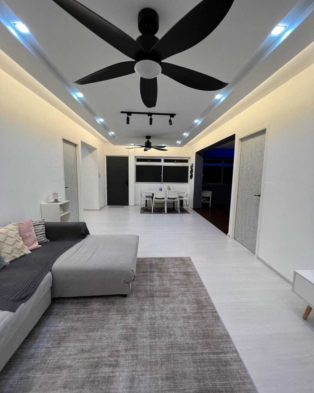 Minimalist Living Room with Drop Light and Ceiling Light