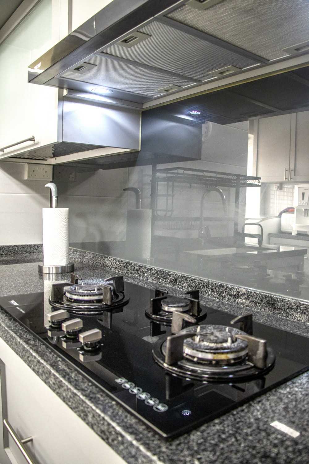 Modern Kitchen with Countertop and Homogeneous Tiles