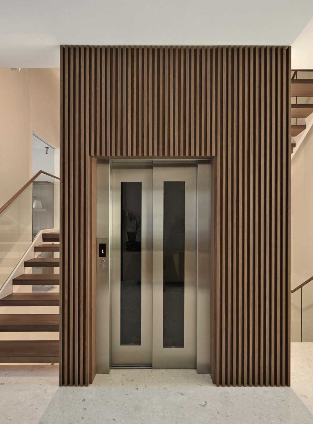 Contemporary Foyer with Artwork and Console Table