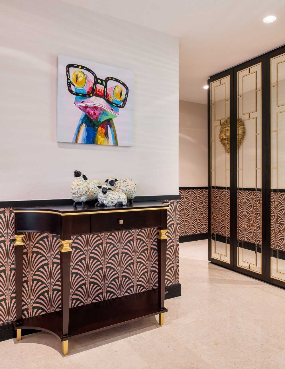 Eclectic Foyer with Artwork and Console Table