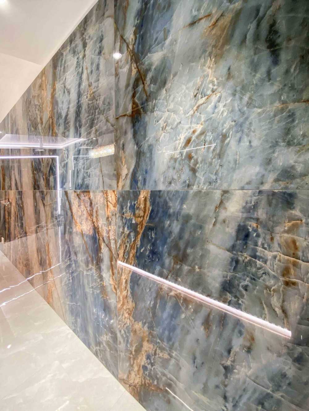 Modern Hallway with Bookshelf and Artwork