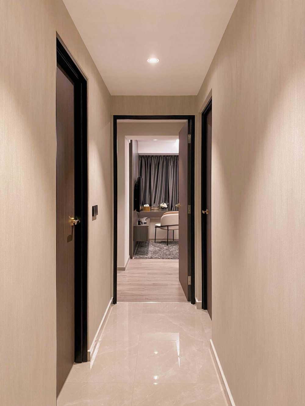 Modern Hallway with Bookshelf and Artwork