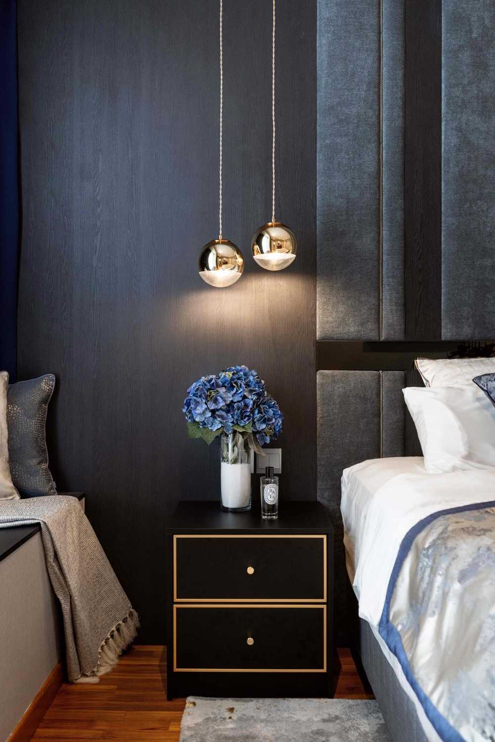Modern Bedroom with Cove Lighting and Bedside Table