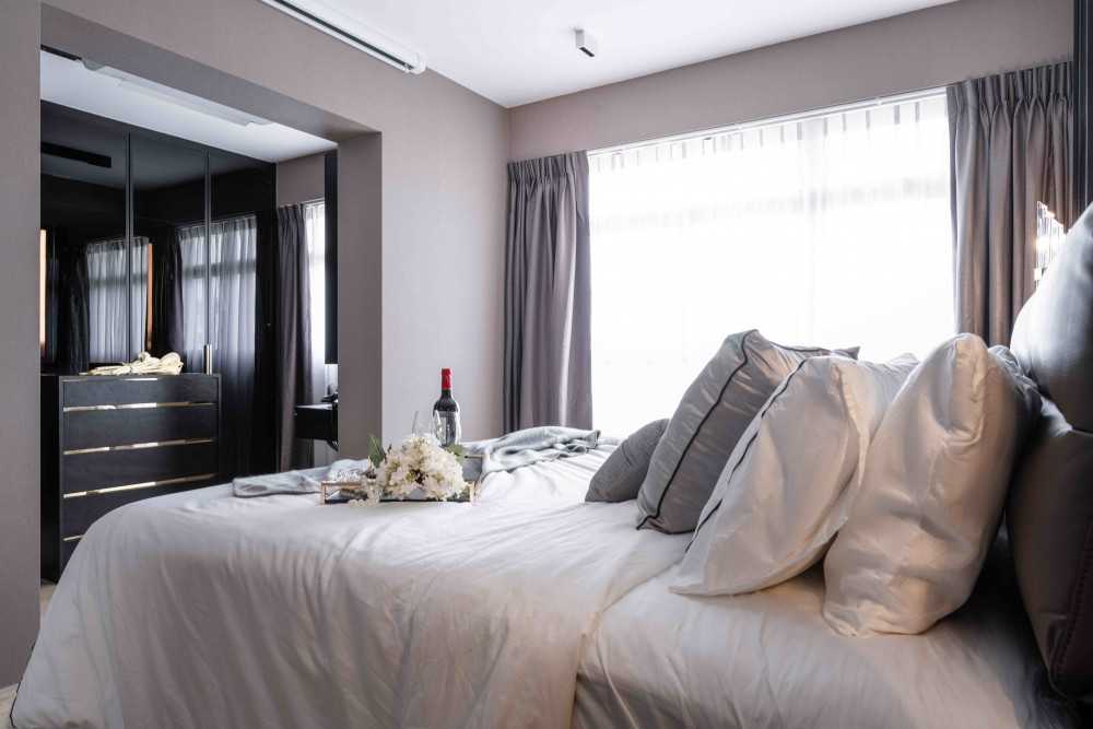 Contemporary Bedroom with Cove Lighting and Built-in Bed