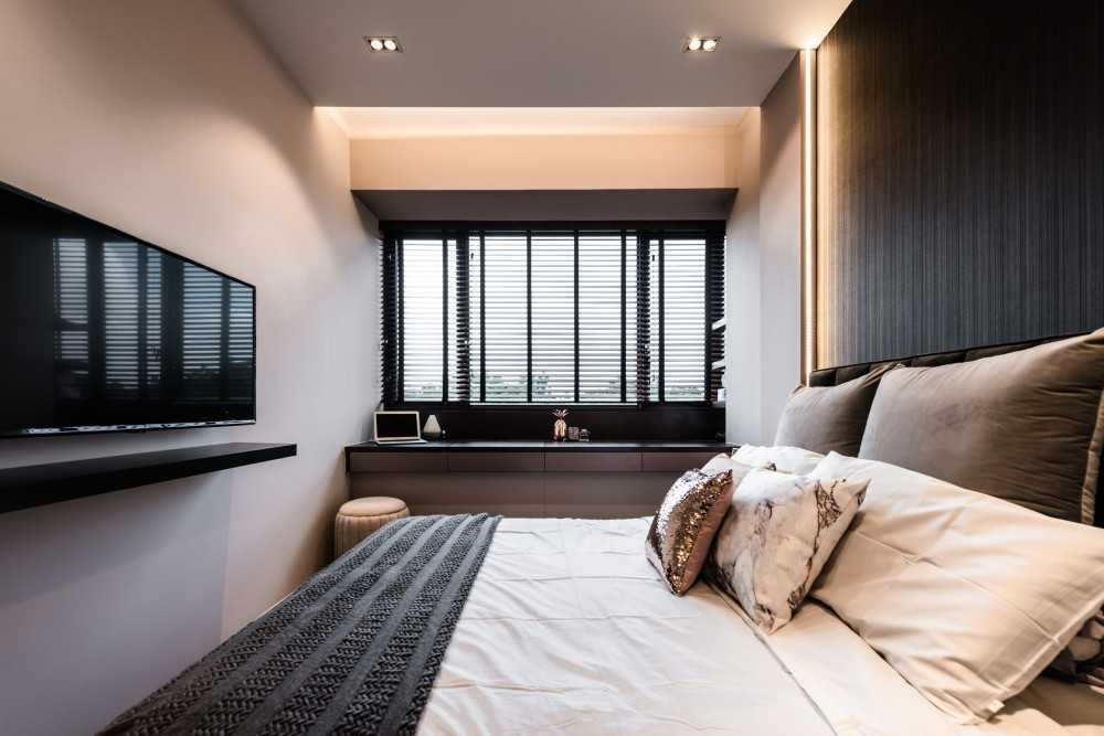 Modern Bedroom with Cove Lighting and Bedside Table