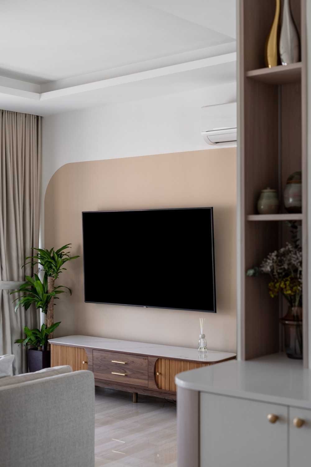 Minimalist Living Room with Bookshelf and TV Console