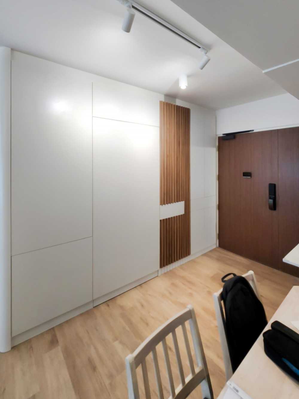 Scandinavian Foyer with Storage Cabinets and Display Cabinets