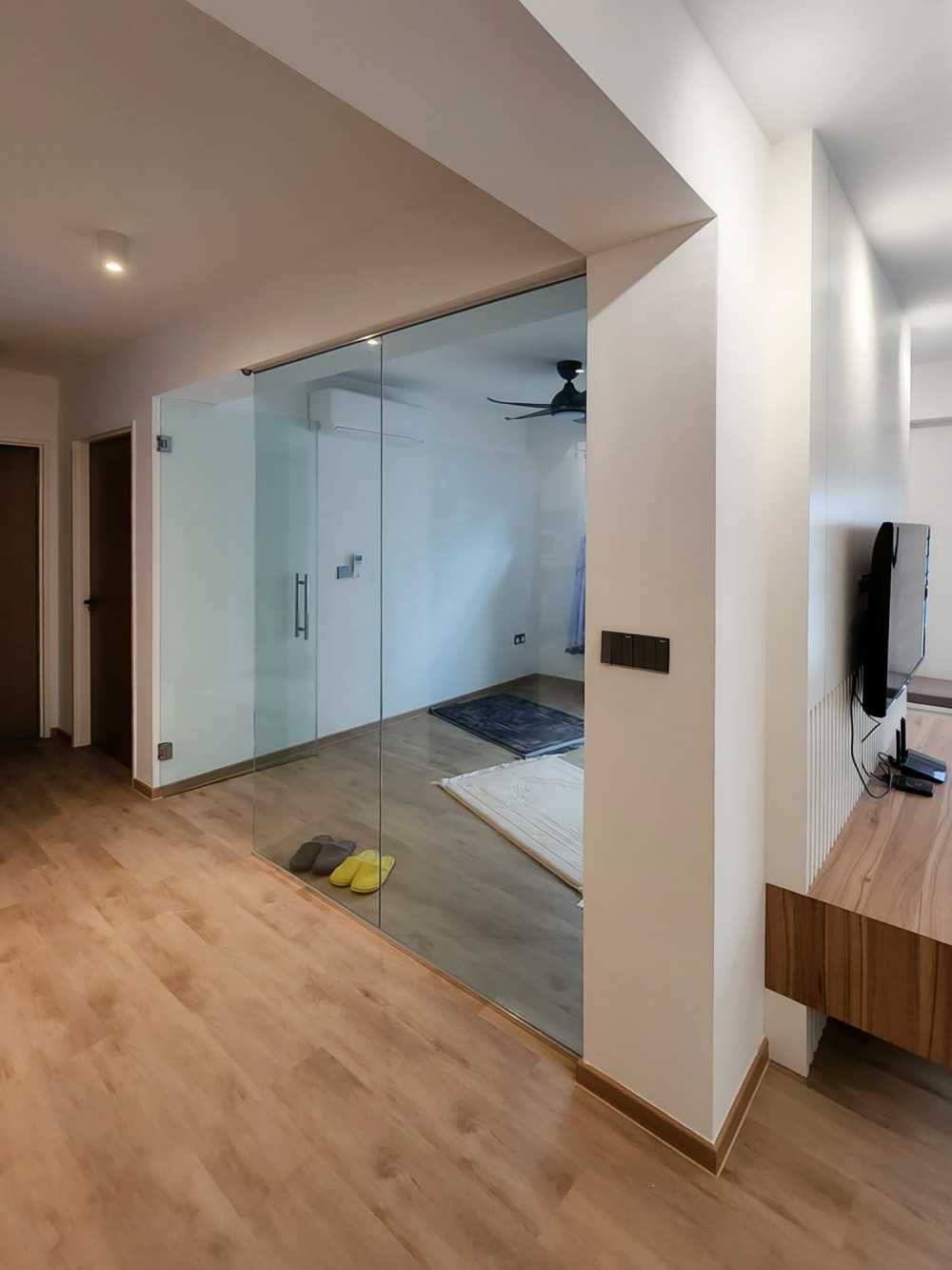 Scandinavian Living Room with Glass Door and Paintings