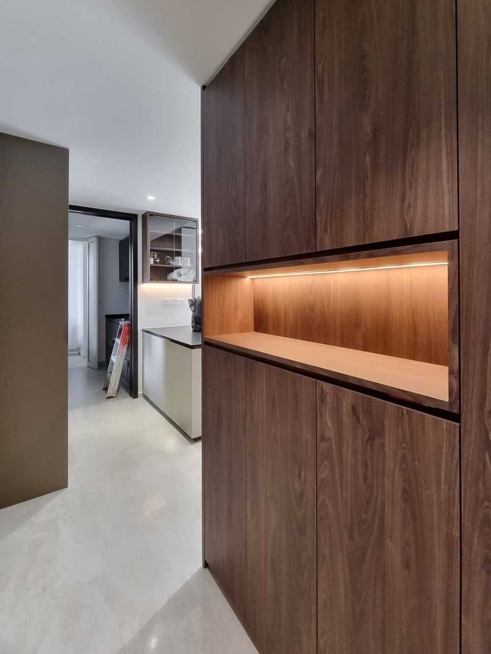 Scandinavian Foyer with Paintings and Storage Cabinets