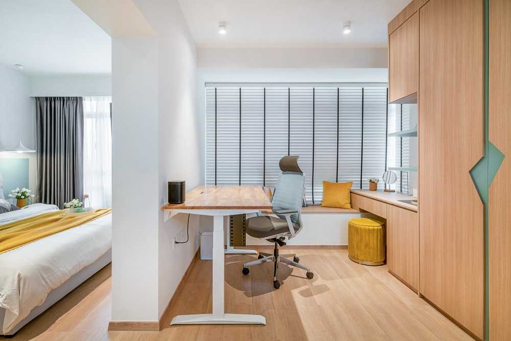 Scandinavian Study with Cove Lighting and Storage Cabinets