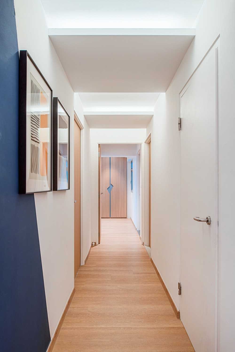 Scandinavian Hallway with Bookshelf and Artwork