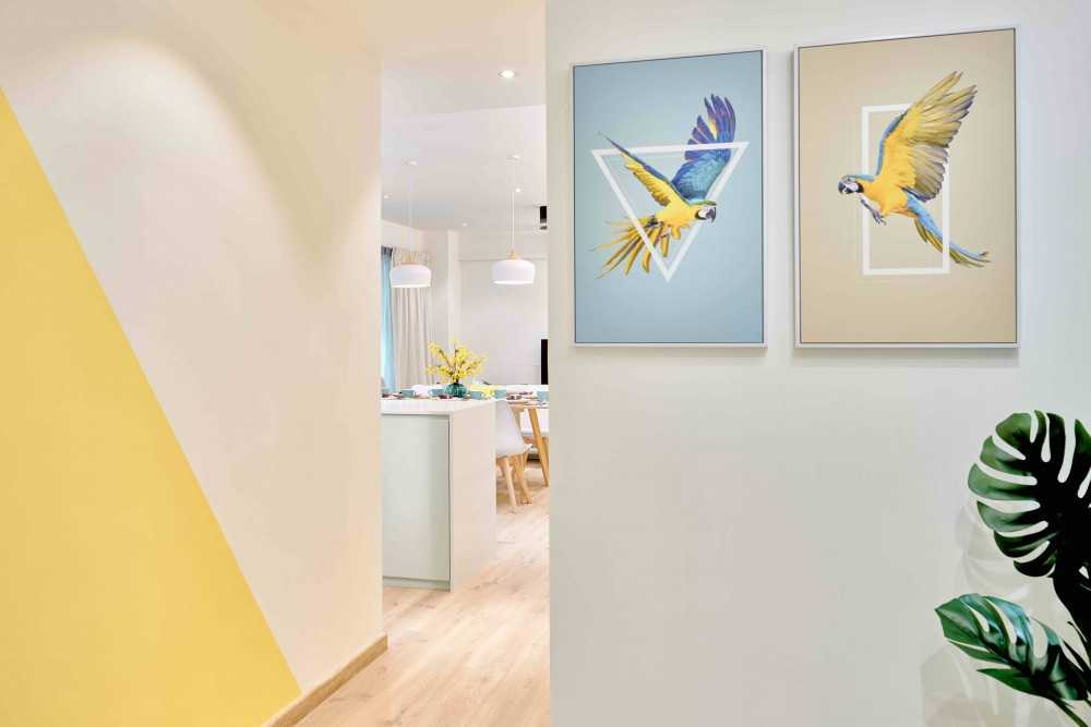 Transitional Foyer with Artwork and Console Table