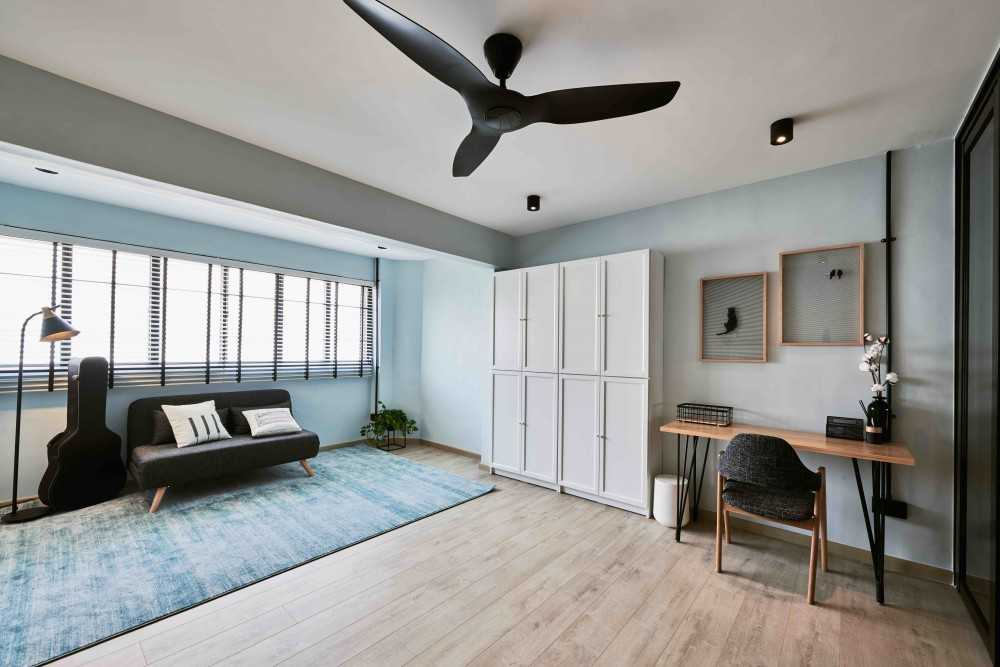 Industrial Study with Desk Chairs and Storage Cabinets