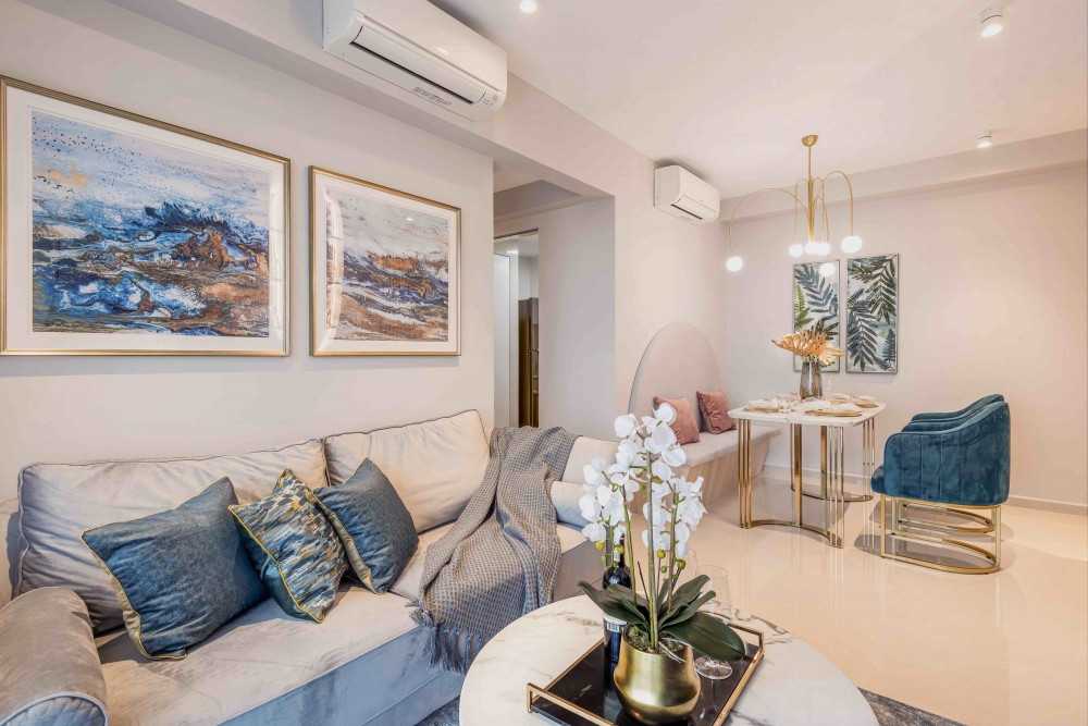 Eclectic Living Room with Cove Lighting and Sofa