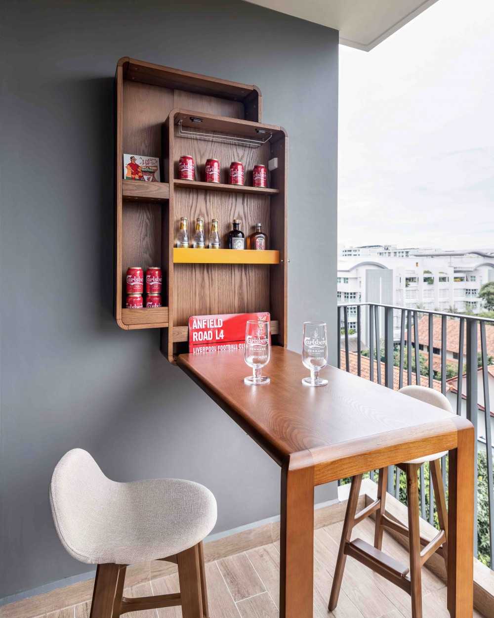 Eclectic Balcony with Window Seat and Outdoor Table