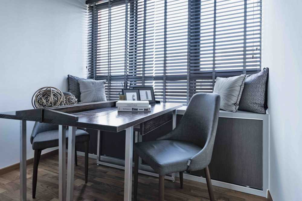 Modern Study with Cove Lighting and Desk Chairs