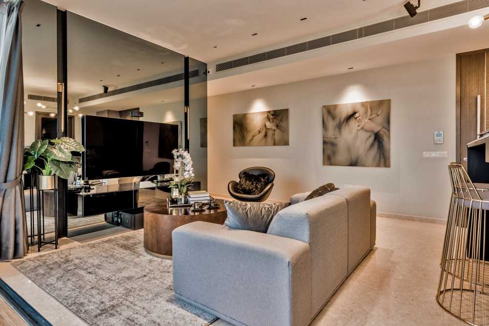 Modern Living Room with Cove Lighting and Coffee Table