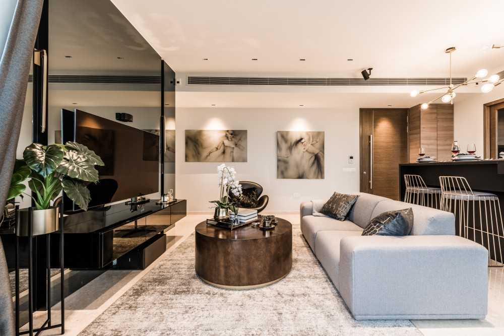 Modern Living Room with Mirror and Cove Lighting