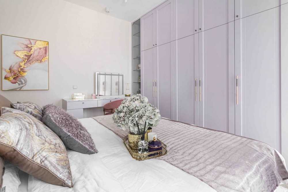 Transitional Bedroom with Cove Lighting and Bedside Table