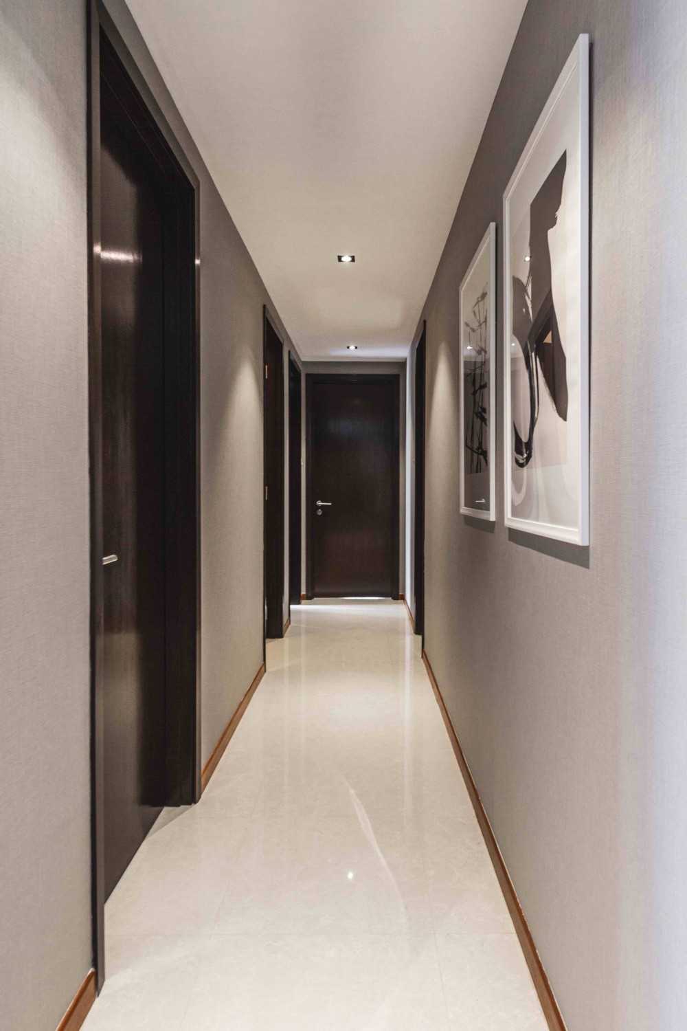 Contemporary Foyer with Artwork and Console Table