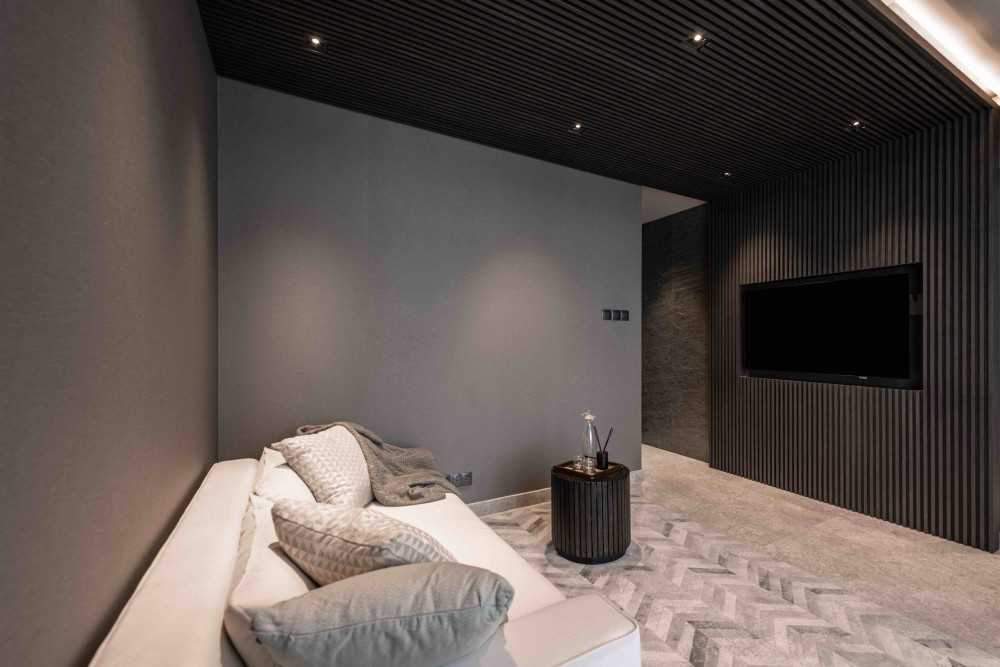 Modern Living Room with Feature Wall and Cove Lighting