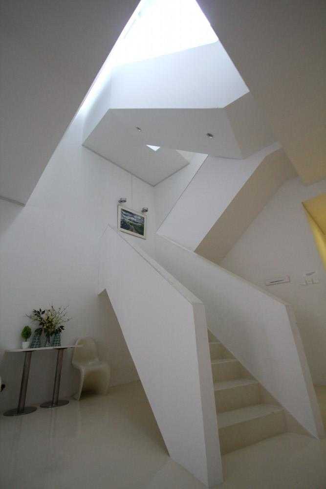 Scandinavian Foyer with Artwork and Console Table