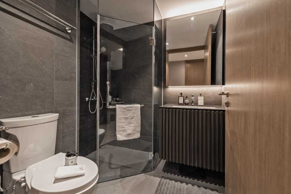 Minimalist Bathroom with Mirror and Shower Screen