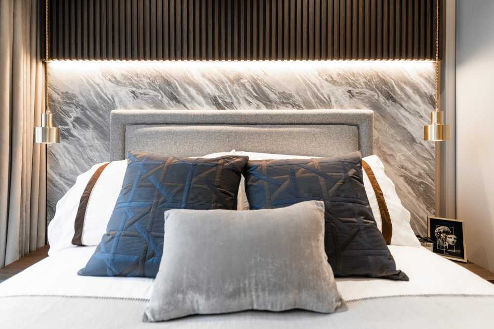 Minimalist Bedroom with Cove Lighting and Built-in Bed