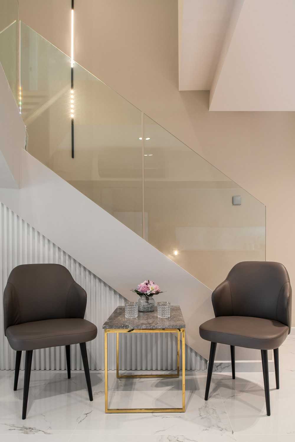 Minimalist Foyer with Artwork and Console Table