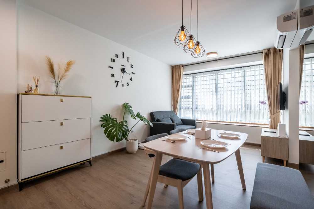 Contemporary Dining Room with Drop Light and Dining Table