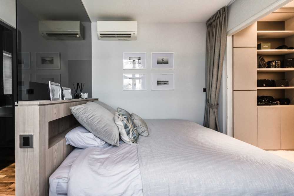 Contemporary Bedroom with Cove Lighting and Built-in Bed