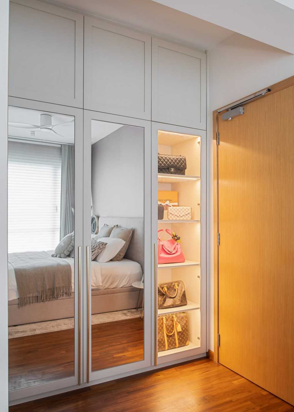 Contemporary Bedroom with Wood Flooring and Closet